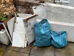 Garden waste and old shelf Two bags of garden waste and an old disassembled shelf, easy access and not too heavy. BN2 - removed for £30