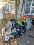 household mixed mostly cardboard, shopping bags, some plasterboard, some laminate flooring. SG18 - removed for £135