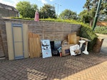 Kitchen fitters waste and more Wooden worktops. Gas hob. Stainless steel sink. Trestle table. 2 stools. Couple bags of wood off cuts and rotary drier. Assorted cardboard and packing material. Worktops are quite heavy. TW11 - removed for £200
