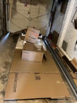 Solar rails, carboard, pallet solar rails pallet and carboard boxes with install rubbish NR12 - removed for £125