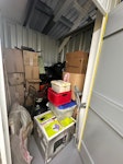 A chair, black bin bags, junk Junk clearance that has been kept in storage, mixture of items. Eg papers, ransom goods, old remote control, chair N7 - removed for £195
