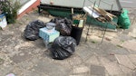 5 bags,wood,2 boxes shelving 5 bin bags 1 plastic box with junk in, small wooden box, garden shelving stand, bits of wood and a plastic bin with bits in. nothing large or very heavy as I am not strong to move anything like that IG6 - removed for £100