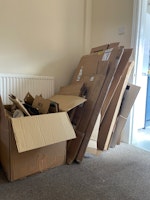 Pile of cardboards collected by Instant Rubbish Removals