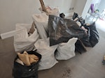 13 rubble sacks and chairs 13 bags of diy waste, two chairs and a stool. waste will be placed outside flat for pick up. it's a red route, but a 20min parking is available. W2 - removed for £100