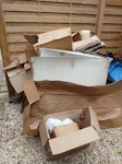 Boxes and stuff Mostly cardboard.  Also some household stuff like small trampoline (see photo), smoker (size of undercounter fridge), dehumidifier, suitcase, garden parasol N10 - removed for £100