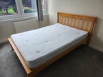 A wooden standard double bed A wooden standard double bed frames with mattress. In good condition and recently been steam cleaned (last month). On first floor so would need to come down stairs (or out first floor window if that's easier. N1 - removed for £125