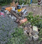 Mix of household and garden Mix of household and garden, including stones and slabs from the garden. All in front garden, next to street. SE22 - removed for £100
