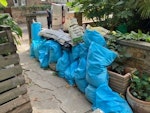 Builder's rubble and rubbish As shown in photo - 30 bags of builder's rubble and some taped up black sheeting N7 - removed for £165