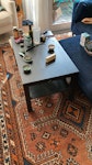 Sofa and coffee table One sofa-bed and one coffee table, both a bit worn but perfectly usable W6 - removed for £100