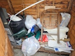 A shed full of stuff We want to get rid of all the stuff that we have in the shed, which includes some tiles, some roofing cardboard, garden tools, two metal garden chairs, a wooden garden table and a big cardboard box. SW19 - removed for £100