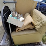 Armchair, rugs, table Various rubbish from clearance of shed - including garden table, leather armchair, 3 rugs, shears, large board (light) and a few small bits BN1 - removed for £70