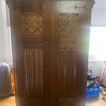An antique double wardrobe A perfectly useable antique wardrobe, few scuffs in one side and a small, carved detail broken off. It is bulky to remove from second floor down stairs ..but street access pretty straight forward in a cul de sac N16 - removed for £90