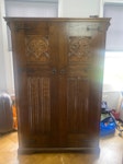 An antique double wardrobe A perfectly useable antique wardrobe, few scuffs in one side and a small, carved detail broken off. It is bulky to remove from second floor down stairs ..but street access pretty straight forward in a cul de sac N16 - removed for £90