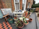 DIY, storage and garden bits Garden mirror (intact), director chairs (2- no covers), garden shed part used fertiliser etc, plant pots, mostly hood, baby changing table, grout, wine rack, shoe rack, shelving rack, miscellaneous diy bits,  wooden parasol and base), some rubbish (garden cane). SW4 - removed for £150