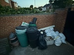 Garden and house rubbish All items in that photo, which include plastic bins, water butts, plastic pots, 9 rubble sacks with mixture of building waste and garden waste, finally a fridge freezer. SL3 - removed for £120