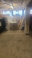 bulk waste items in bin store collected by M&V waste Clearance