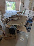 Building Waste Building waste  
Old door and radiator 
Flooring 
Plaster 
Plaster board 
Timber 
Light fightings 
Stripped wallpaper WR1 - removed for £190