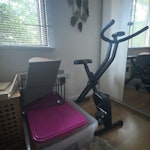 Household items Folding exercise bike (broken - photo shows it open), 4 under bed strorage boxes and lids (all useable) vinyl storage crate (broken), rocker board and a small area rug (not shown), NW2 - removed for £75