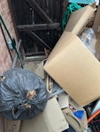 cardboard, garden and misc packaging and cardboard, some garden waste and minor household items SW13 - removed for £100