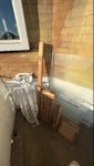 shower screen,iron board,wood An Old Glass Shower Screen, The main parts of an Ironing Board, and some Wooden furniture pieces. SW2 - removed for £50