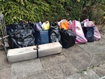 16 bags mostly cut up wood 16 bags of cut up wooden chairs a cut up wooden window frame some tree branches and old hamper some packaging and some misilaneous items. SE4 - removed for £80