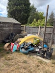 Miscellaneous household Chair, posts and concrete, laminate, cardboard boxes, chicken wire and general rubbish. B78 - removed for £400