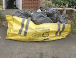 Bag of mixed waste It's a mix of garden waste, some metal (from a parasol) and a few black bags of regular household waste. SO30 - removed for £150