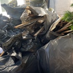 45 bags renovation waste 45 black sacks mainly old plaster and timber lath with some brick pieces and roof insulation offcuts. in front garden for street collection N16 - removed for £290