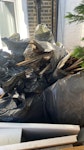 45 bags renovation waste 45 black sacks mainly old plaster and timber lath with some brick pieces and roof insulation offcuts. in front garden for street collection N16 - removed for £290