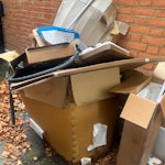 cardboard, chair and suitcase mostly cardboard plus two suitcases and broken chair TW1 - removed for £50
