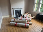 Old carpet and underlay About 40sqm of rolled up old carpet and underlay, to be picked up from front room on ground floor and front room on first floor E7 - removed for £190