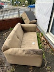 Sofa and chair Old, dirty sofa and matching chair. Not in the best condition so unlikely to be able to be reused. Both are in the front garden (and have been stored there for some time so may be damp) and can be lifted over the fence instead of trying to manoeuvre through the flat. ST5 - removed for £150