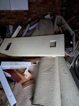 Carpet, underlay, door, woods Carpet, underlay (for 2 bedroom flat) + 1 light wooden door + few broken prices of laminated flooring, wood needs to be removed from the garage. SM2 - removed for £125