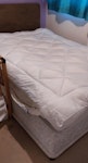 Double Mattress and Divan Base Standard second hand double divan bed with:
• A spring mattress (fire safety labels attached, few small stains). 
• A divan base (splits into two sections, no drawers, fire safety labels attached). Slight discolouration and some stains.
• A brown headboard.


Collection details:
• Bed has already been dismantled and is in the hallway. 
• Easy access to our house and free on street parking. Note there are some outside steps down to our front door. Our house is opposite the bus stop. LS10 - removed for £75