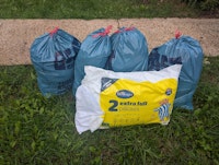 4 black bags rubbish 2 pillows collected by hanworth auctions ltd
