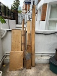 two bags rubble and various wood offcuts, old stair runner, broken garden pots, old black dustbin, mirror,
two half builders bags of garden rubble and old tiles, old window blind. N5 - removed for £100