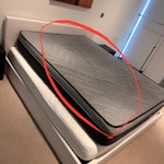 One double-size top mattress It's one dark-grey double-sized top mattress which are located above the main white top mattress. E14 - removed for £85