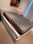 One double-size top mattress It's one dark-grey double-sized top mattress which are located above the main white top mattress. E14 - removed for £85