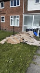 Old laminate floorin Old laminate flooring, underlay which is in black bags, a small child's play table and a domestic carpet shampooer. M45 - removed for £200
