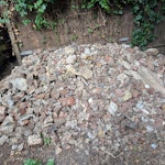 Rubble and scrap from garden Junk dug out of the garden - mostly bricks and rubble. I've tried to keep the larger pieces visible in the photos (some fence post and tiles). Also a pile of scrap and old wood. N7 - removed for £420