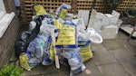 Bathroom waste some of bathroom waste and light waste in bags N1 - removed for £175