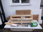 Bathroom waste Fibreglass bath, sink pedstal, wall panelling, cardboard packaging, wood pallet and small amount of general waste and metal. DA14 - removed for £80