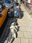 Gardnen waste and parasol Garden waste , broken sun parasol , boxing bag, old clothes SW12 - removed for £120