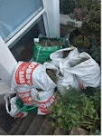 12-13 bags of garden waste I have 12-13 bags of garden waste (picture attached) The white bags in the picture can go with you to the waste centre but the garden waste from the green bags have to be disposed of into the van so that I can keep the reuseable green bags. E5 - removed for £90