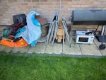 Old house/garden stuff Garden chairs, barrel for burning stuff, old lawn mower and its box, microwave, bbq, cardboard EN8 - removed for £75