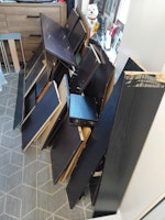 Books, dvds and plank of wood collected by S K waste services Ltd