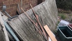 Junk from inside and outside A tyre, an old ac unit, tins, 2 CRT televisions. A lot of wood, some metal items, old chest of drawers TW14 - removed for £100