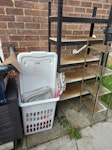 Microwave and other bits Microwave 2 storage shelves egg shaped hanging chair a medium sized rug and a clothes basket L21 - removed for £100