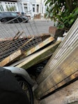 DIY household + garden refuse A variety of wood from our deck that has been replaced. Garden refuse in bags, a broken mirror. Planks vary in size from 2x4s through to offcuts. 3x pallets. Metal cage. Some of the wood is in good condition to be reused. SW19 - removed for £140