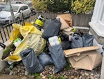 Garden rubble and waste 12ish sacks of rubble, pile of tree branches, 3 pavings stones (pictured), other gardening waste SW17 - removed for £140